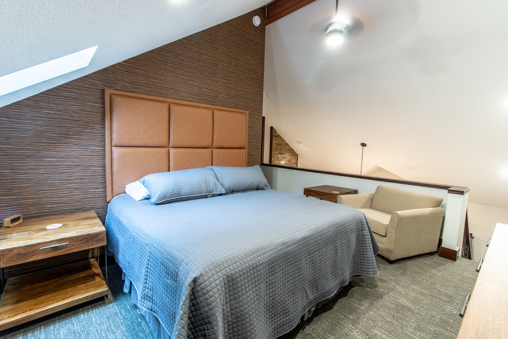 Example of a mid-sized transitional loft-style carpeted and gray floor bedroom design with brown walls