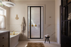 European-Inspired Bathroom Blends Modern and Traditional Features