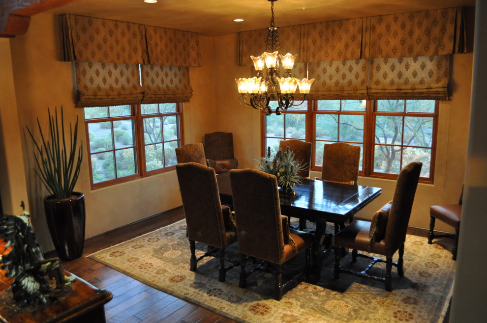 Example of a transitional dining room design in Orange County