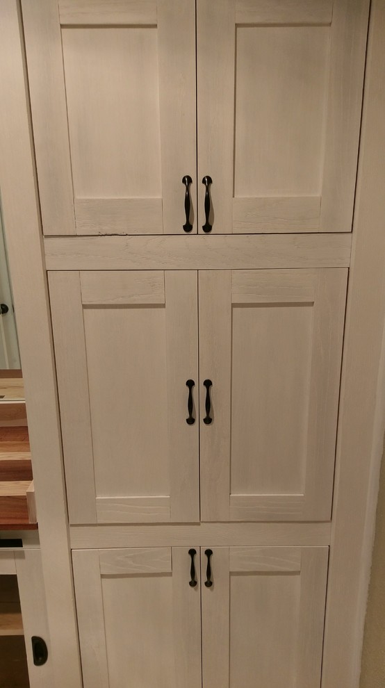 Home design - large transitional 3/4 home design idea in Austin with shaker cabinets, white cabinets and wood countertops