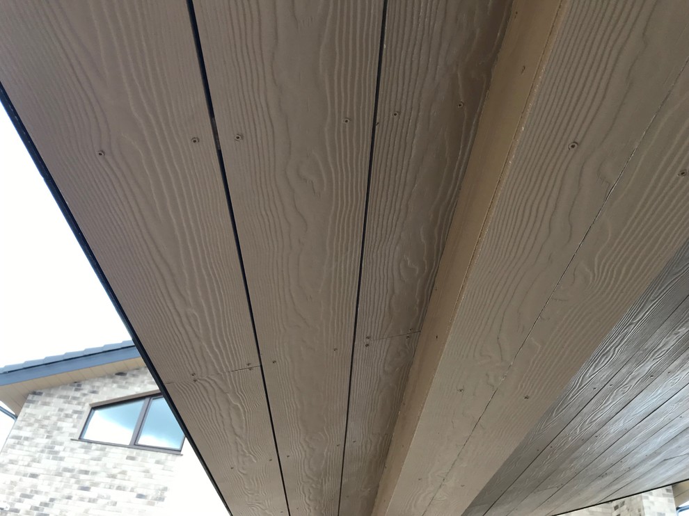 Подшивка свесов фиброцементным сайдингом Cedral.