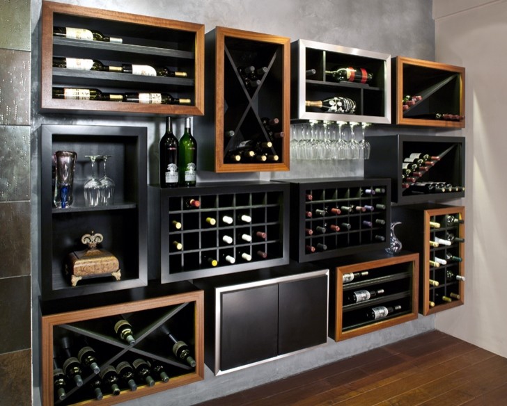 This is an example of a mid-sized contemporary wine cellar in Phoenix with medium hardwood floors, display racks and brown floor.