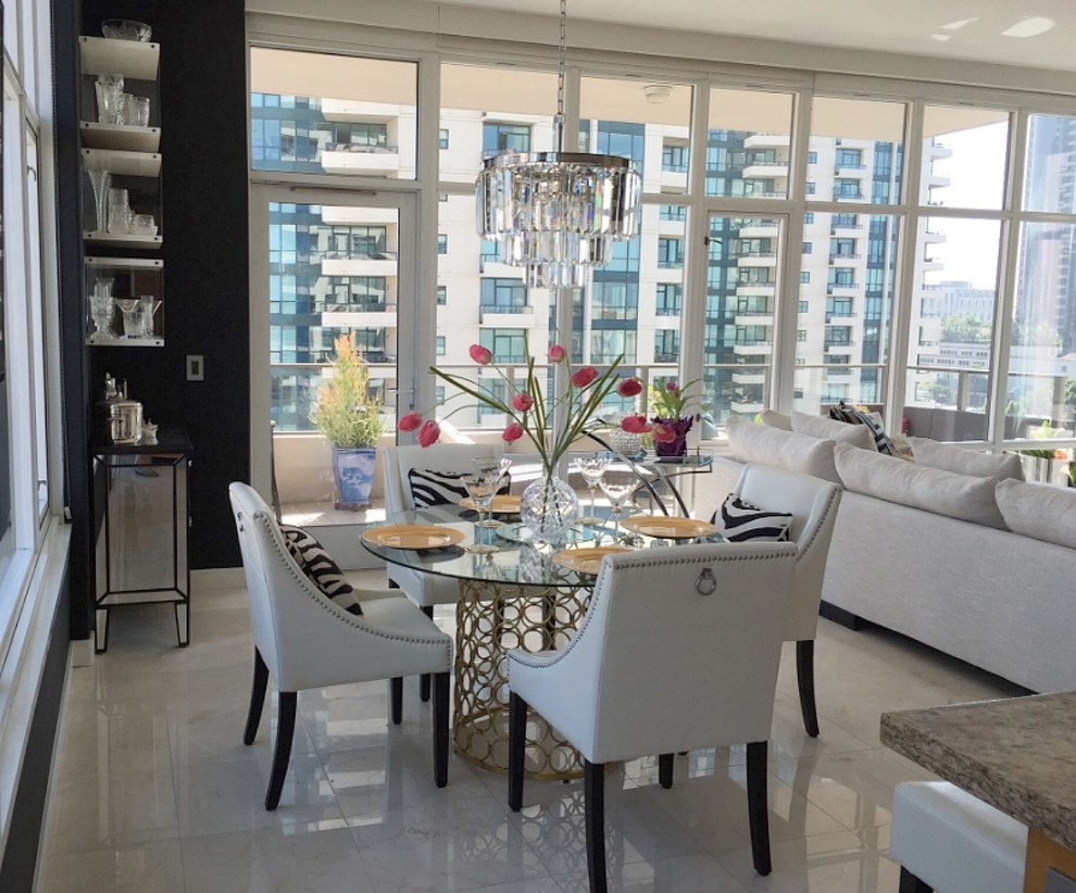 Inspiration for a contemporary open plan dining in San Diego with black walls, linoleum floors and beige floor.
