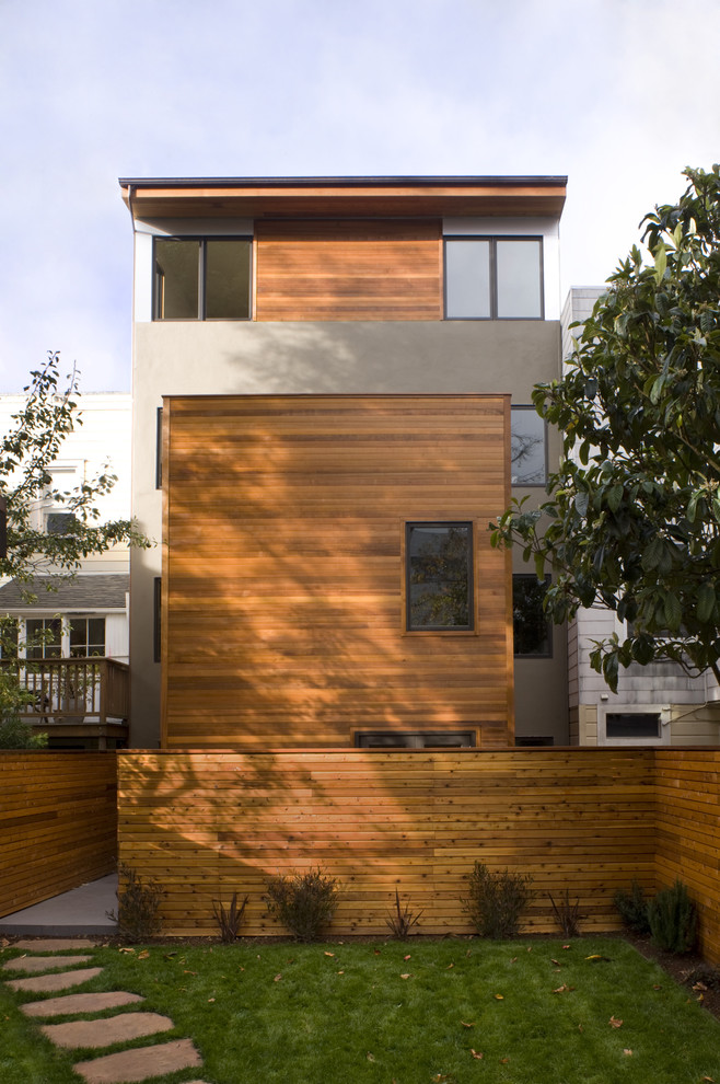This is an example of a modern exterior in San Francisco with wood siding.