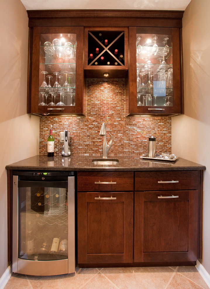 This is an example of a traditional home bar in Indianapolis.