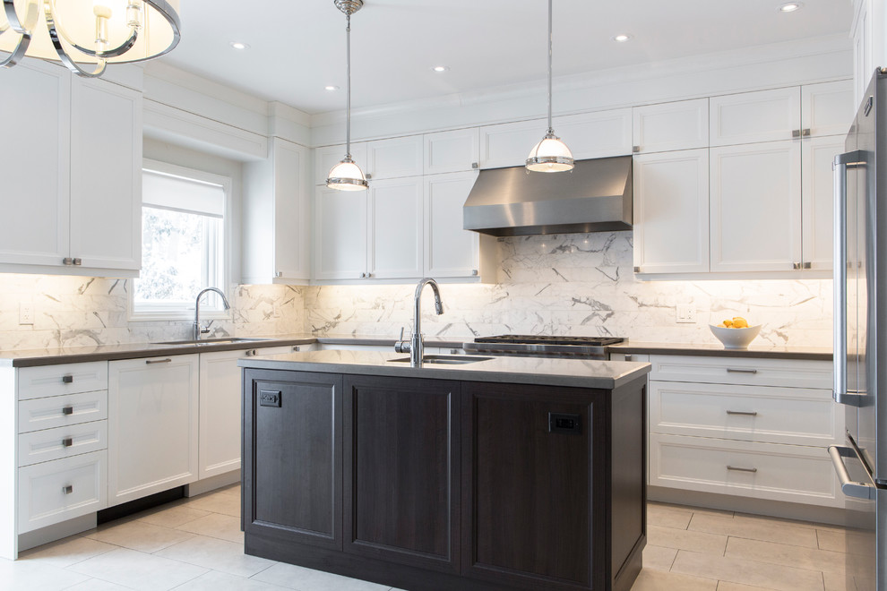 Eat-in kitchen - mid-sized transitional u-shaped porcelain tile eat-in kitchen idea in Toronto with an undermount sink, recessed-panel cabinets, white cabinets, quartz countertops, white backsplash, stone tile backsplash, stainless steel appliances and an island