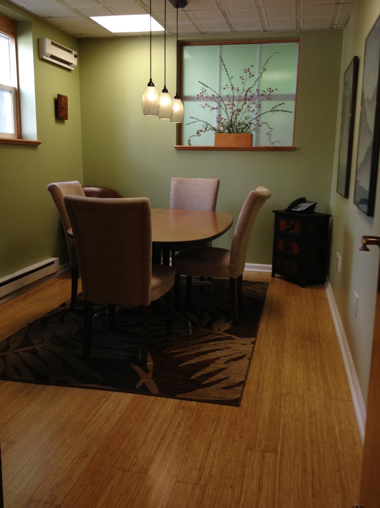 Design ideas for a contemporary dining room in Baltimore with bamboo floors and yellow floor.