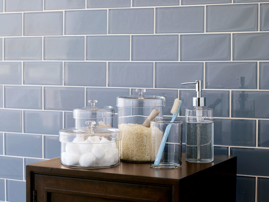 Inspiration for a mid-sized contemporary bathroom in Los Angeles with gray tile, glass tile and grey walls.