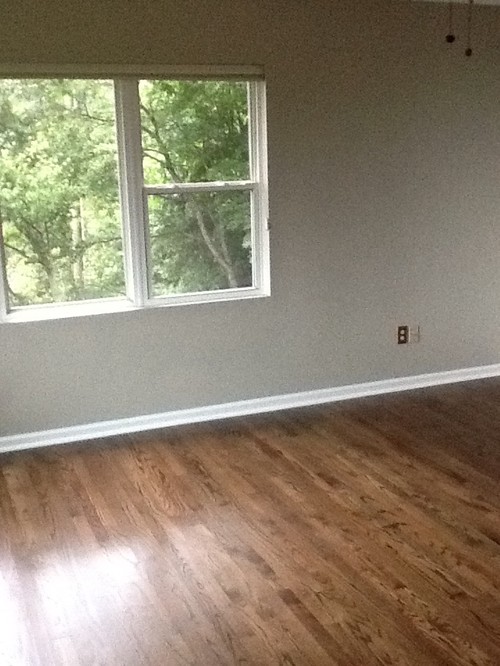 Dark Flooring And Clay Colored Walls