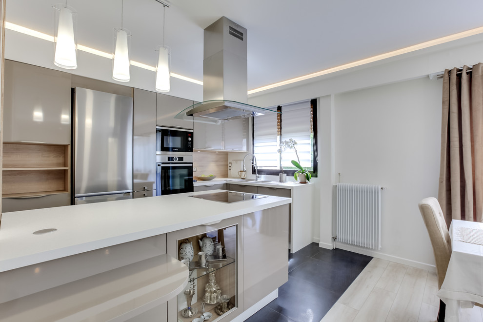 Photo of a mid-sized contemporary l-shaped open plan kitchen in Paris with with island, a double-bowl sink, flat-panel cabinets, brown cabinets, laminate benchtops, panelled appliances, ceramic floors and black floor.