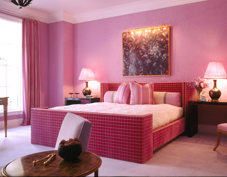 Photo of an eclectic bedroom in New York with pink floor.