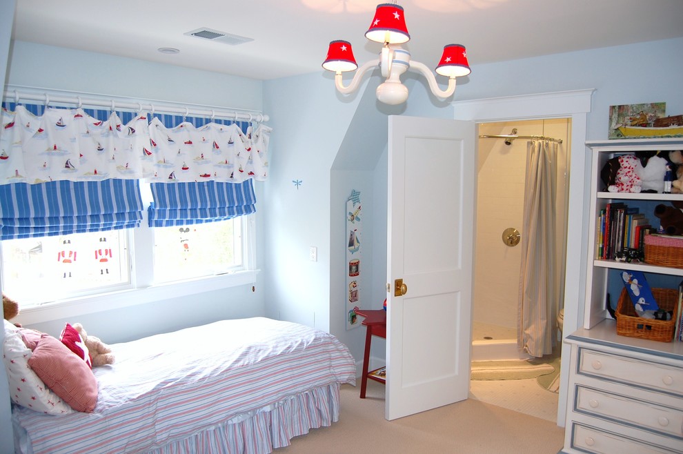 Photo of a mid-sized traditional kids' bedroom for kids 4-10 years old and girls in San Francisco with blue walls, carpet and beige floor.