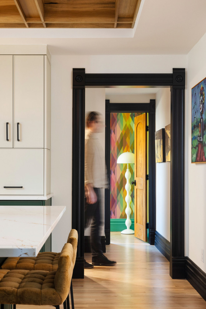 Inspiration for a large eclectic u-shaped light wood floor and coffered ceiling enclosed kitchen remodel in Denver with flat-panel cabinets, green cabinets, quartz countertops, multicolored backsplash, ceramic backsplash, an island and white countertops