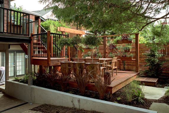 Design ideas for an asian patio in Vancouver with a vertical garden and decking.