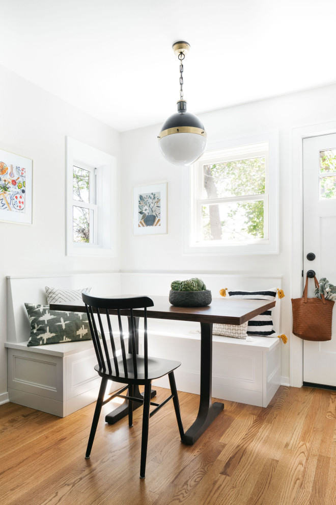 Breakfast nook - small transitional light wood floor breakfast nook idea in Chicago