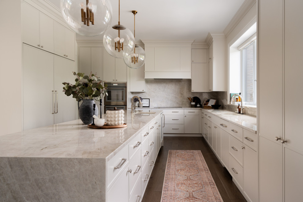 Example of a transitional kitchen design in Montreal