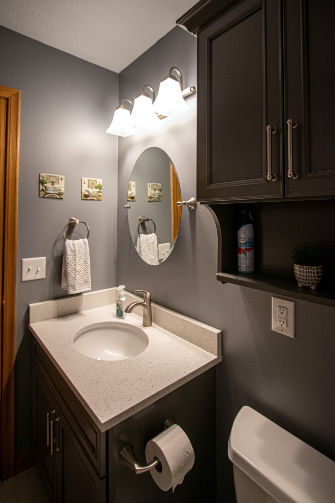 Inspiration for a small transitional 3/4 bathroom in Cleveland with flat-panel cabinets, dark wood cabinets, an alcove tub, a two-piece toilet, grey walls, an undermount sink, marble benchtops, beige floor, beige benchtops, a single vanity and a built-in vanity.