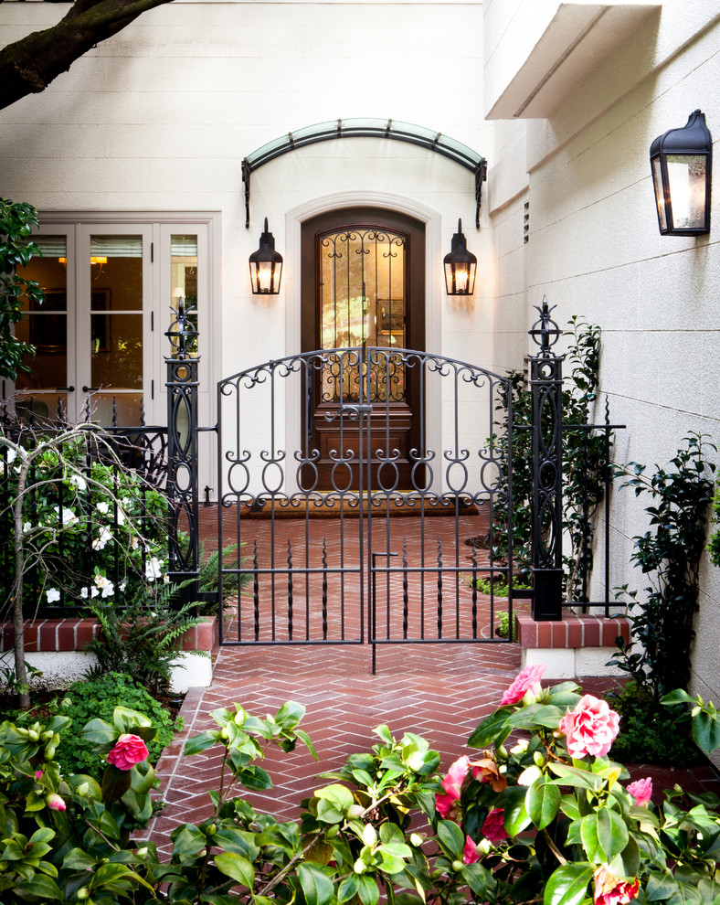 Inspiration for a large timeless front door remodel in San Francisco with a glass front door and white walls