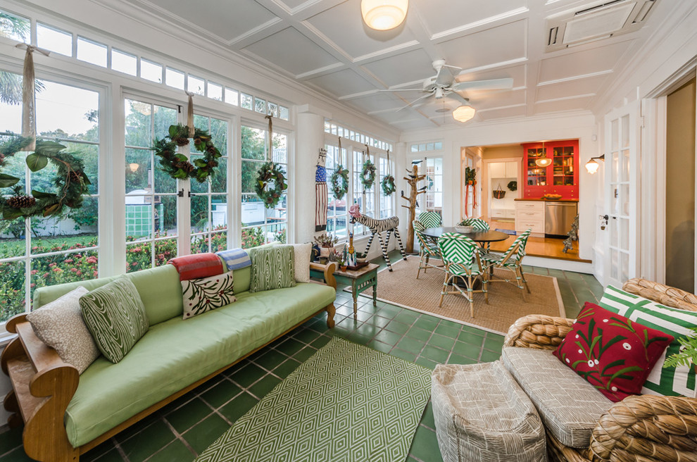 This is an example of an eclectic sunroom in Tampa with ceramic floors, a standard ceiling and green floor.