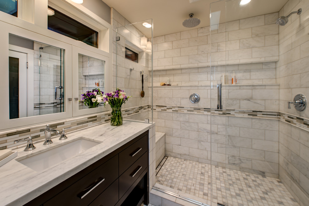 Inspiration for a mid-sized transitional master bathroom in San Francisco with an undermount sink, furniture-like cabinets, dark wood cabinets, marble benchtops, a double shower, a two-piece toilet, white tile, stone tile, grey walls, marble floors, multi-coloured floor and a sliding shower screen.