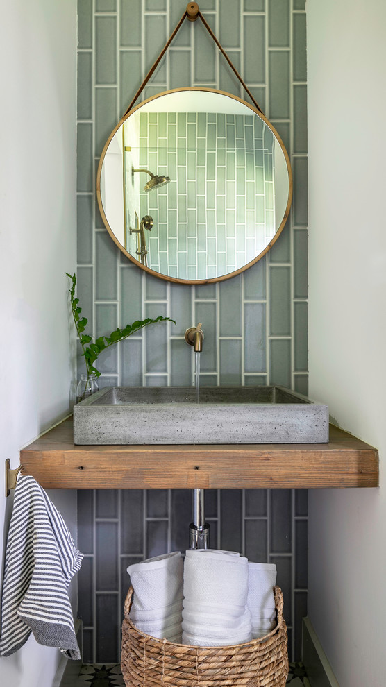 Farmhouse 3/4 powder room photo in Austin