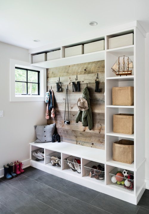 Rustic farmhouse DIY mudroom designs and mud rooms ideas we love… mudroom cubbies, cabinets, baskets, mudroom organization ideas and of course, mudroom benches, too. What great ideas for a mud room in your home.