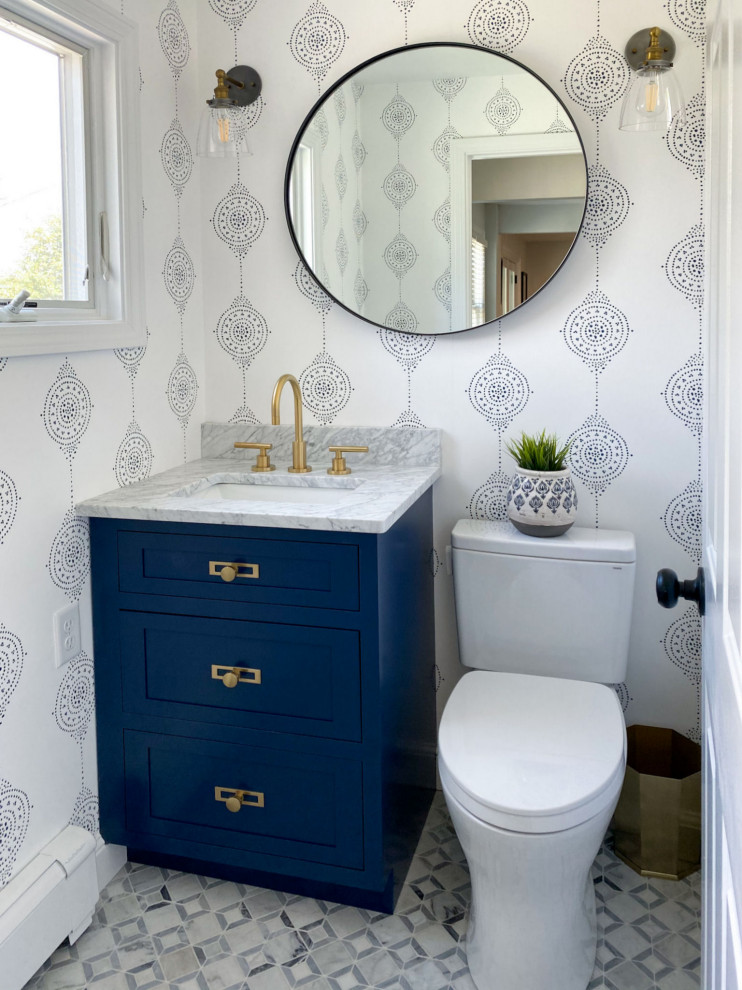 Inspiration for a small classic cloakroom in Boston with shaker cabinets, blue cabinets, a two-piece toilet, marble flooring, a submerged sink, marble worktops, grey floors, grey worktops, a built in vanity unit and wallpapered walls.