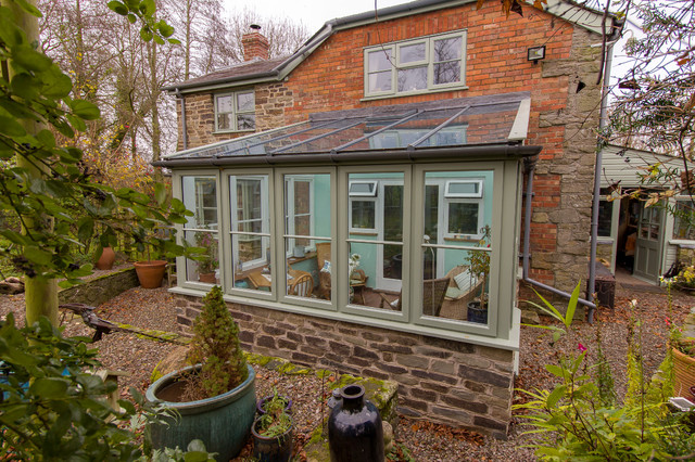 Simple Mono Pitch Conservatory accessed from the kitchen uterum