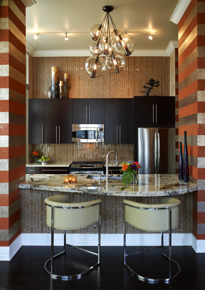 Photo of a small contemporary galley eat-in kitchen in Chicago with matchstick tile splashback, stainless steel appliances, granite benchtops, brown splashback, flat-panel cabinets, dark wood cabinets, dark hardwood floors, with island and an undermount sink.