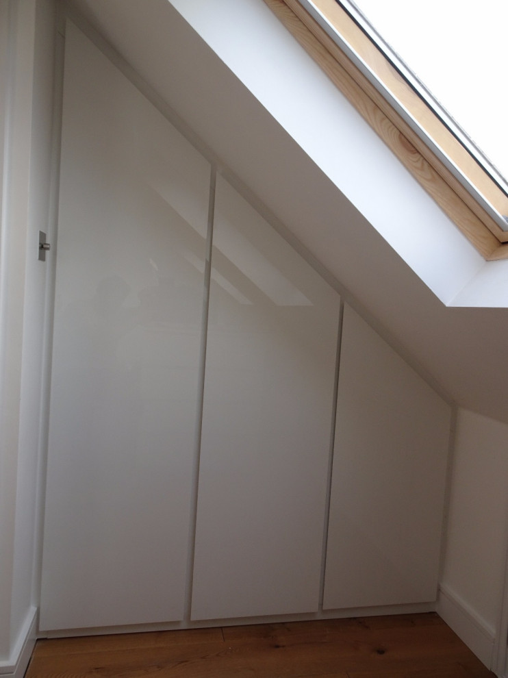 Sliding drawer storage for pitched roof space