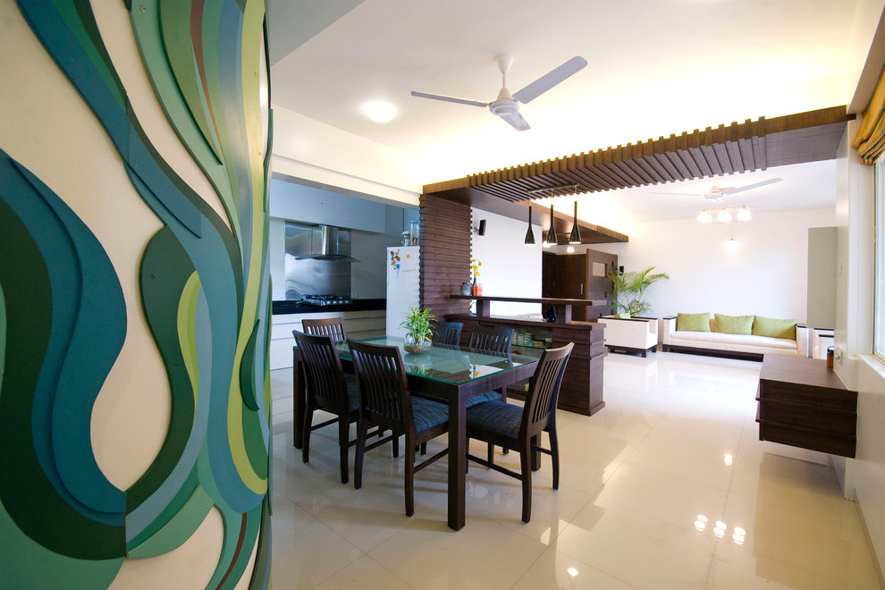 This is an example of a modern dining room in Pune.