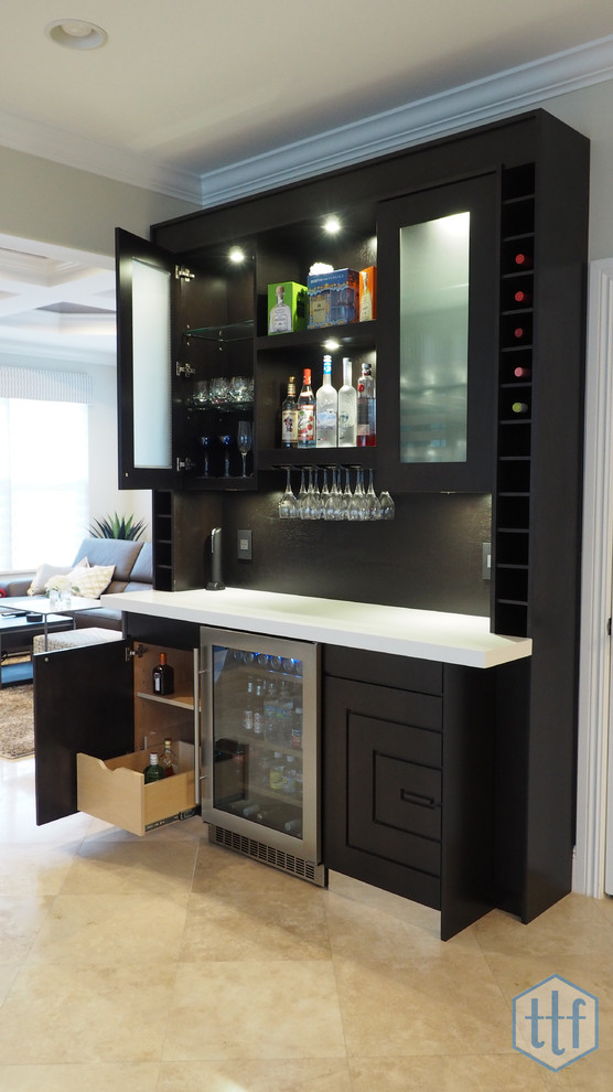Design ideas for a mid-sized contemporary single-wall seated home bar in Miami with flat-panel cabinets, dark wood cabinets, ceramic floors and brown splashback.