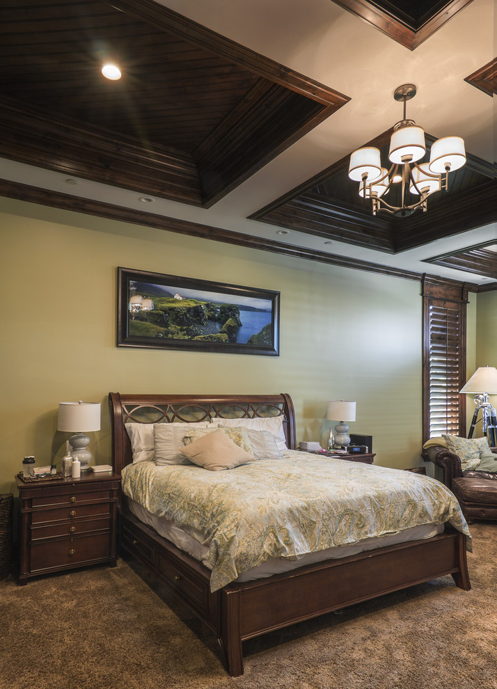 Design ideas for a large traditional master bedroom in Salt Lake City with carpet.