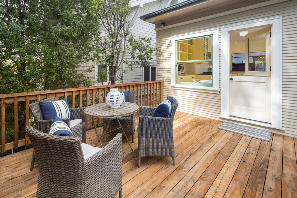 Patio - mid-sized craftsman backyard wood beige patio idea in San Francisco with decking and no cover