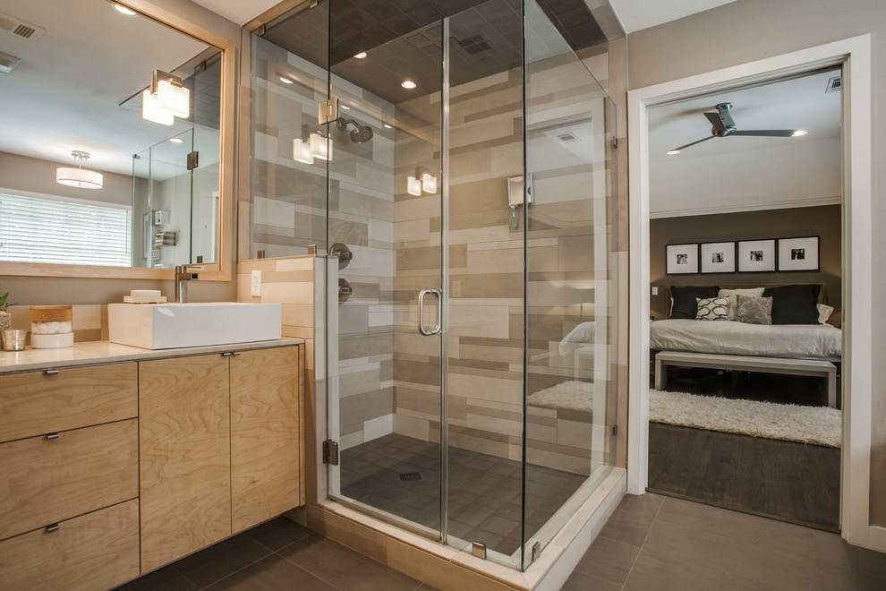Mid-sized contemporary master bathroom in Dallas with a vessel sink, flat-panel cabinets, light wood cabinets, quartzite benchtops, a corner shower, multi-coloured tile and porcelain floors.