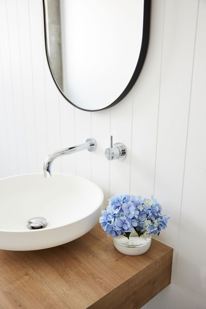 Photo of a contemporary powder room in Sydney.