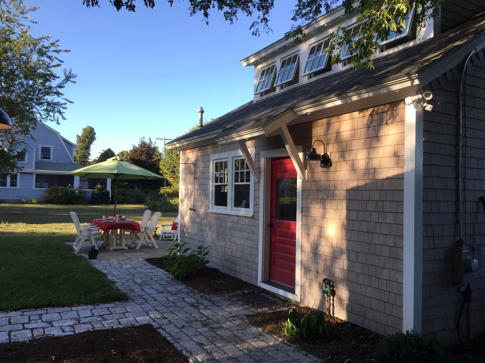 Design ideas for a traditional exterior in Providence with wood siding.