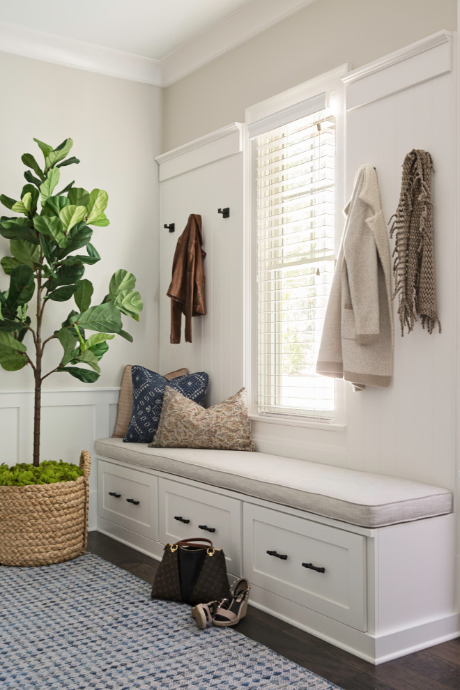 Inspiration for a transitional mudroom in Orlando with grey walls, dark hardwood floors and brown floor.