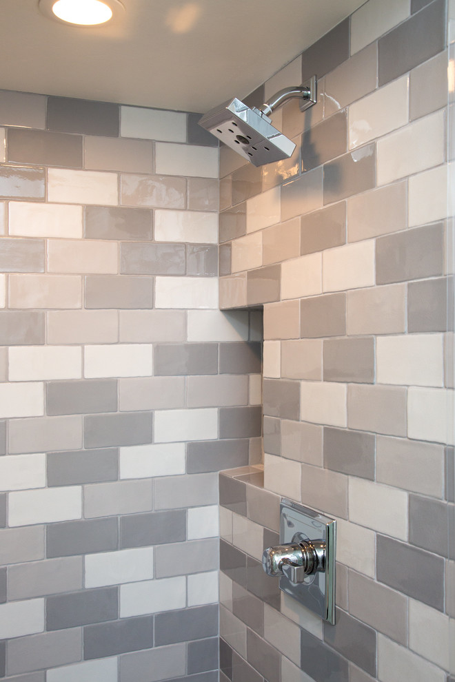 Photo of a small country kids bathroom in San Francisco with flat-panel cabinets, white cabinets, an alcove shower, a two-piece toilet, white tile, subway tile, grey walls, porcelain floors, an integrated sink, marble benchtops, white floor and a hinged shower door.