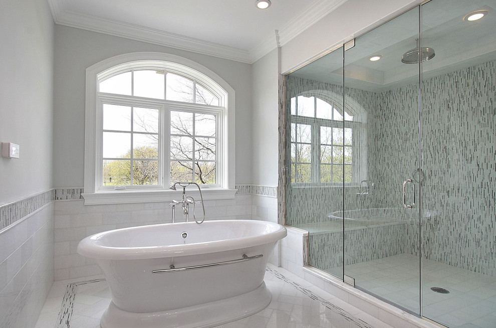 Freestanding bathtub - large transitional master black and white tile, white tile and matchstick tile marble floor freestanding bathtub idea with white walls