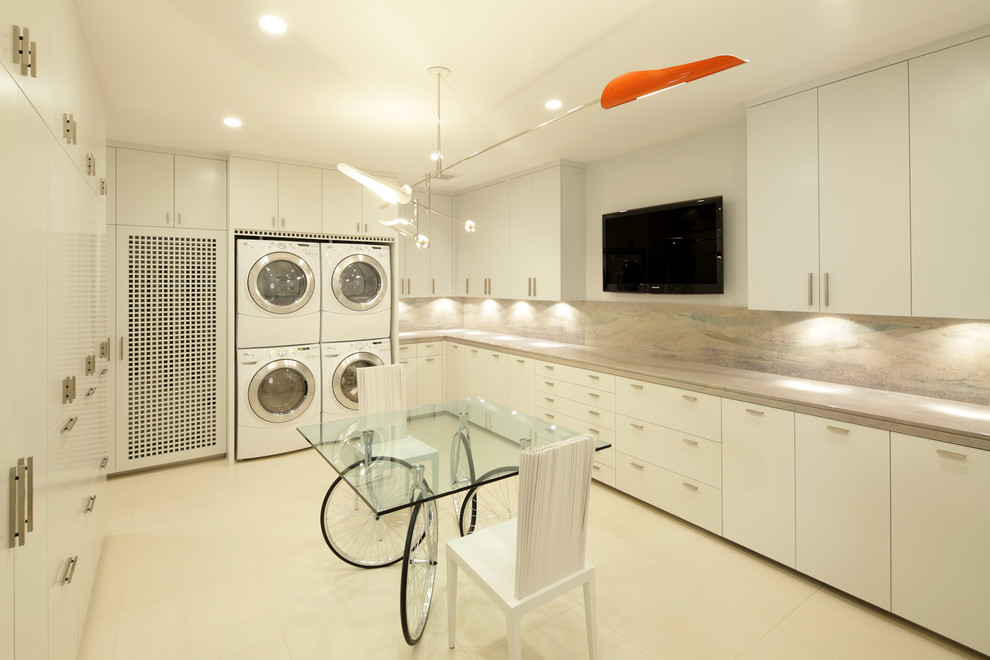 Inspiration for a contemporary laundry room in Other with a stacked washer and dryer.