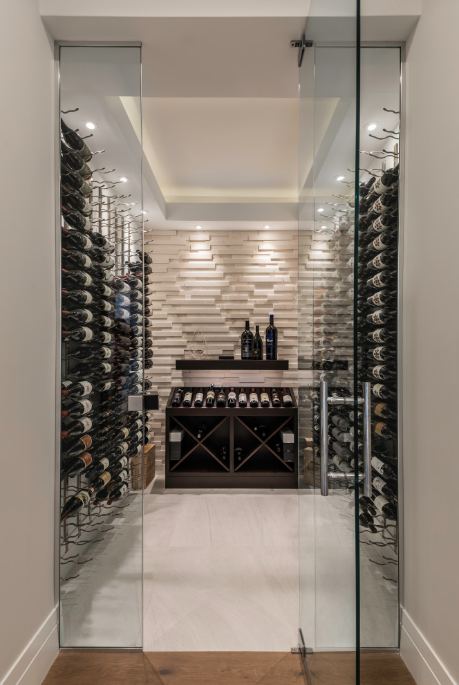 Photo of a beach style wine cellar in Other.