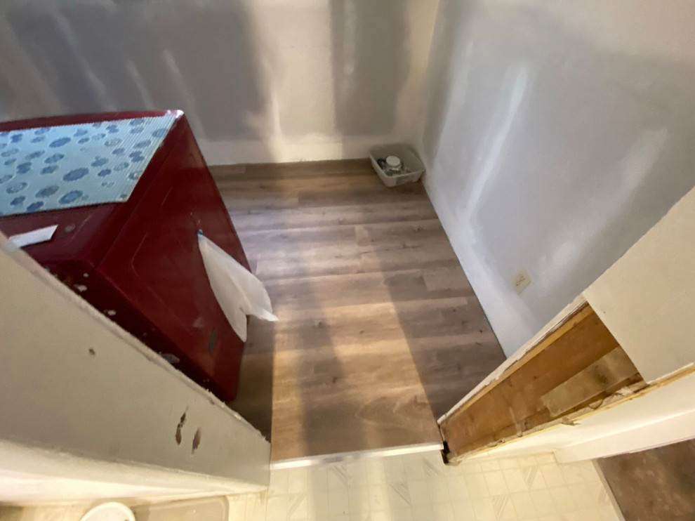 Interior Heating/Drywall/Flooring - Okotoks