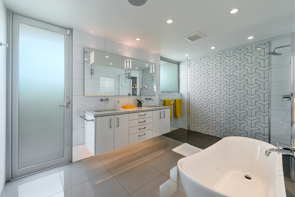 Inspiration for a contemporary master white tile porcelain tile bathroom remodel in Los Angeles with an undermount sink, flat-panel cabinets, white cabinets and quartzite countertops