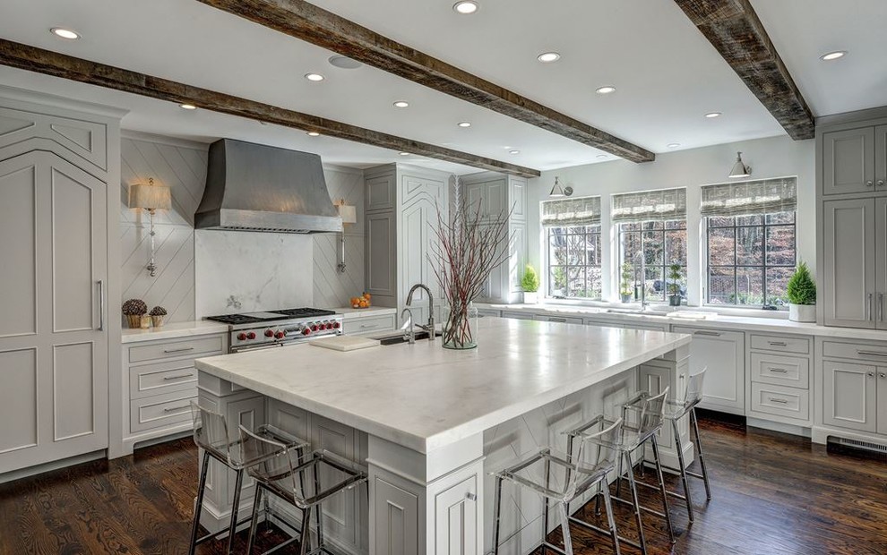Kitchen pantry - large transitional l-shaped dark wood floor kitchen pantry idea in Denver with a drop-in sink, shaker cabinets, white cabinets, laminate countertops, multicolored backsplash, mosaic tile backsplash, stainless steel appliances and an island