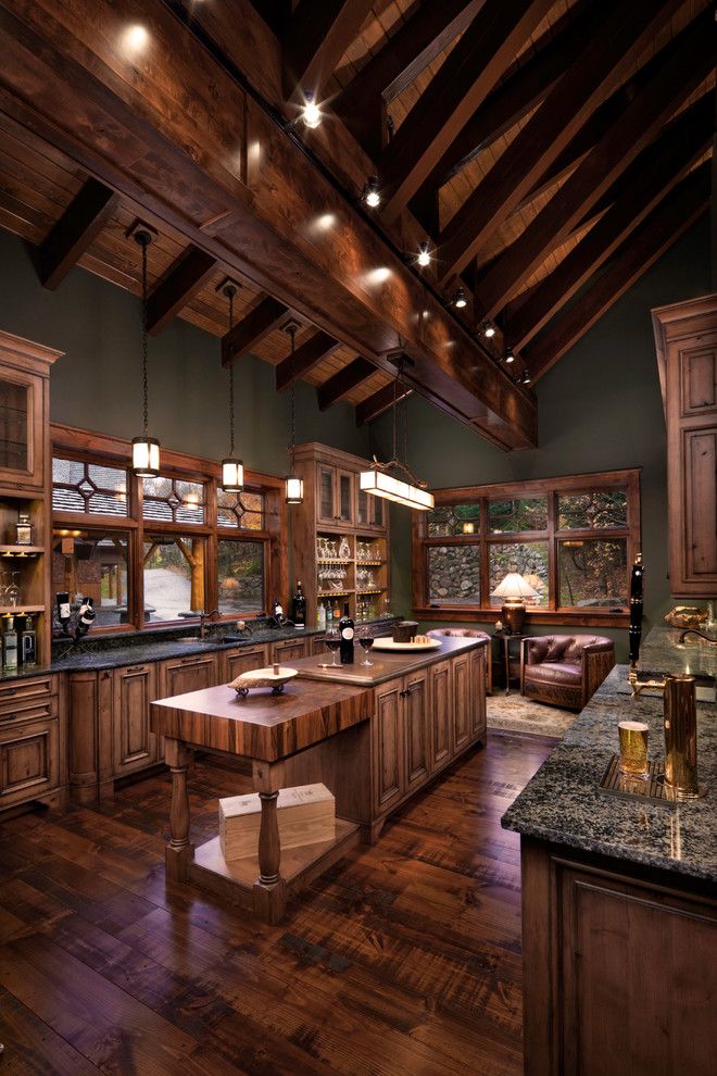 Expansive country wine cellar in Other with medium hardwood floors.