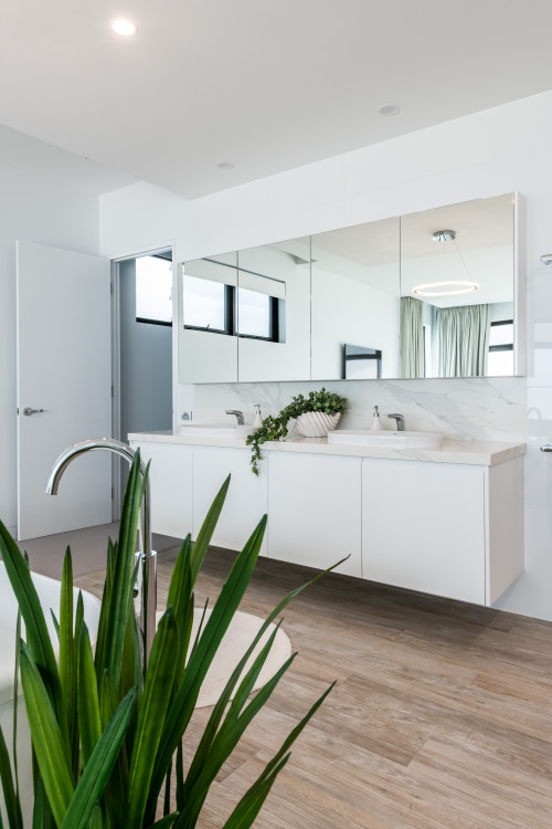 White Bathroom Vanity and Wood-Look Floor
