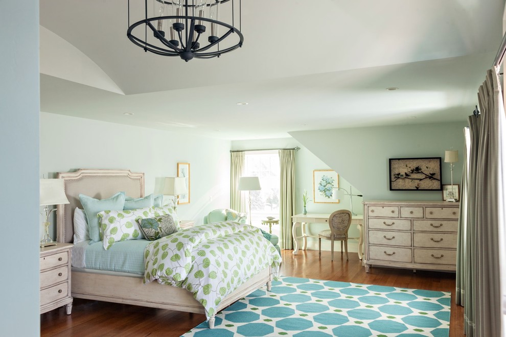 Design ideas for a large beach style guest bedroom in Boston with blue walls, medium hardwood floors and no fireplace.