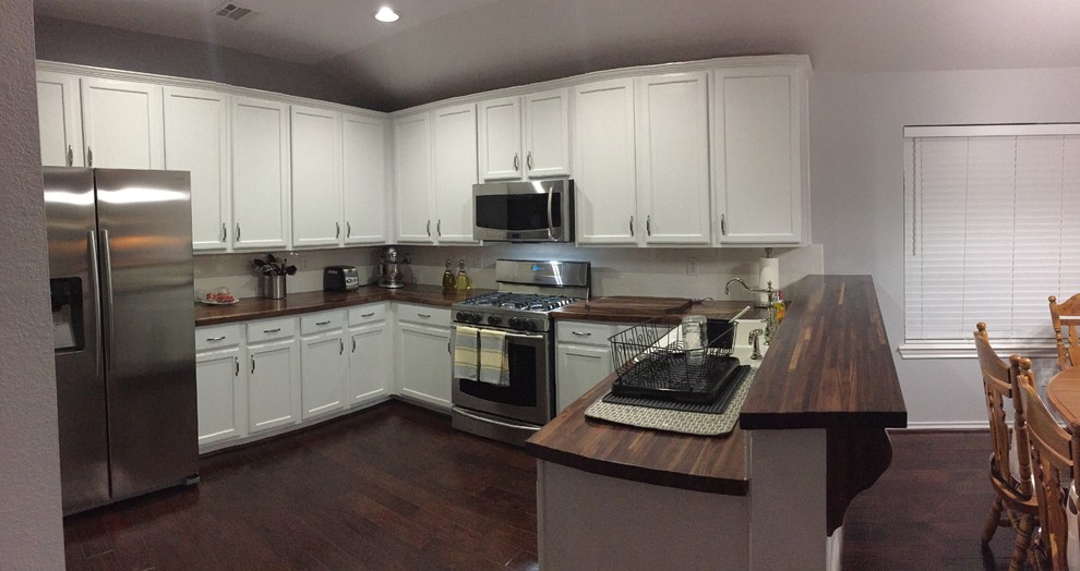 Inspiration for a timeless bamboo floor and brown floor kitchen remodel in Dallas with beaded inset cabinets, copper countertops, beige backsplash, ceramic backsplash and beige countertops
