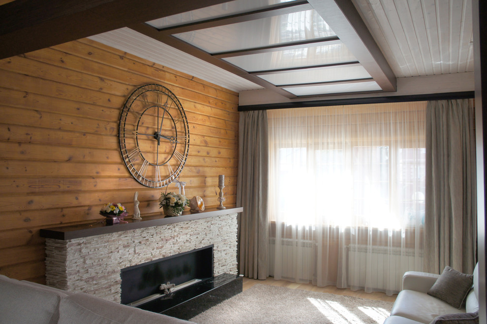 Дизайн кухни и гостиной в загородном доме из бруса.